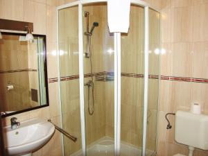 Kúpeľňa v ubytovaní Adler Hotel