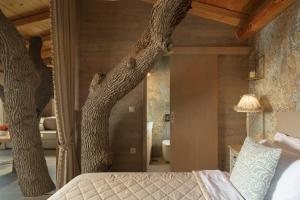 Ένα ή περισσότερα κρεβάτια σε δωμάτιο στο Stolidi Mou Treehouse