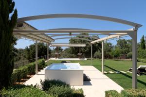 The swimming pool at or close to Stolidi Mou Treehouse