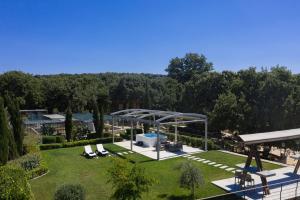 The swimming pool at or close to Stolidi Mou Treehouse