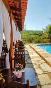 Swimmingpoolen hos eller tæt på Hotel Fazenda Serra da Irara