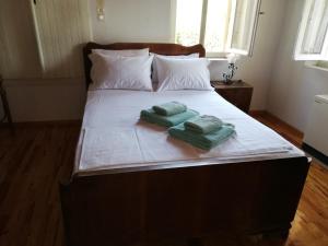 Posteľ alebo postele v izbe v ubytovaní ZISSI'S HOUSE