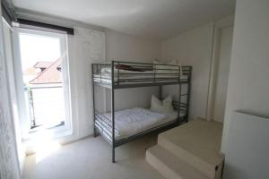 Postel nebo postele na pokoji v ubytování Villa am Meer Penthouse