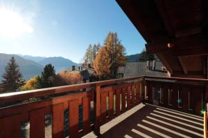 a balcony with a view of the mountains at Arolla 8 in Verbier