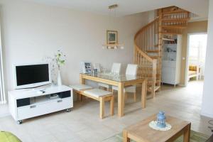 Μια τηλεόραση ή/και κέντρο ψυχαγωγίας στο Haus Ostseeblick App 06 - Leuchtturm