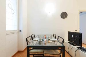Televízia a/alebo spoločenská miestnosť v ubytovaní SV18C Charming modern flat S Ambrogio