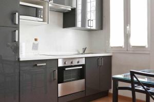 Kuchyňa alebo kuchynka v ubytovaní SV18C Charming modern flat S Ambrogio
