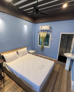 מיטה או מיטות בחדר ב-The Voyager Guesthouse
