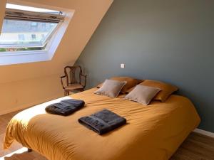 Säng eller sängar i ett rum på La villa Noukey à 150m de la plage et des cabines