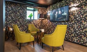 TV a/nebo společenská místnost v ubytování Thon Hotel Linne