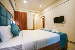 Φωτογραφία από το άλμπουμ του Inn Temple Town σε Guruvayur +16 φωτογραφίες