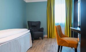 Postel nebo postele na pokoji v ubytování Thon Hotel Linne