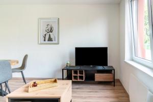 Μια τηλεόραση ή/και κέντρο ψυχαγωγίας στο Gemütlich 1