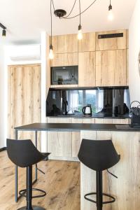 Kuchnia lub aneks kuchenny w obiekcie Apartamenty pod Szyndzielnią Enduro&Ski