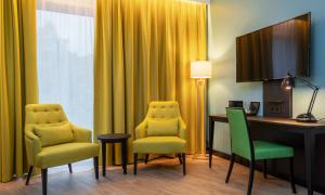 TV a/nebo společenská místnost v ubytování Thon Hotel Linne