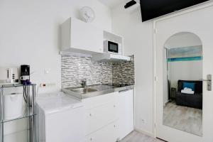 Kuchyňa alebo kuchynka v ubytovaní Comfortable studio - 2P - Grenelle