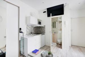 Kuchyňa alebo kuchynka v ubytovaní Comfortable studio - 2P - Grenelle