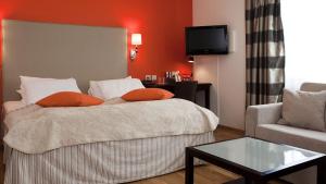 Postel nebo postele na pokoji v ubytování Thon Hotel Linne