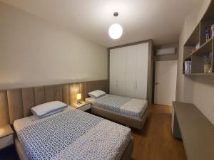 Krevet ili kreveti u jedinici u okviru objekta Four Seasons Vlora