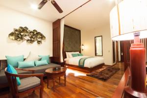 Voodi või voodid majutusasutuse Lotus Blanc Resort toas