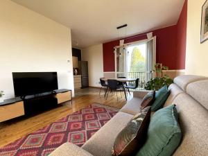 Posezení v ubytování Appartamento moderno in Tenuta Melloni
