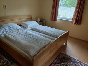 Postel nebo postele na pokoji v ubytování Ferienwohnung Vertatschablick