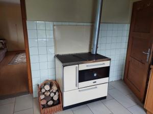 Kuchyň nebo kuchyňský kout v ubytování Ferienwohnung Vertatschablick