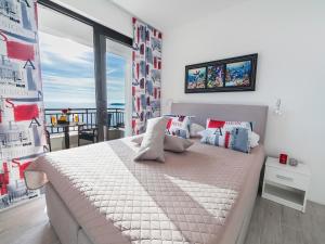 Cama ou camas em um quarto em Villa Mona 2