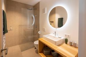 Koupelna v ubytování am Greben Apartments eins - zwei - sechs - sieben + 27 fotografií