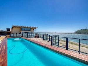 a swimming pool with a view of the water at Luxury Condo-loft Point Waterfront - Two bedroom plus Loft in Durban