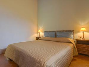 Postel nebo postele na pokoji v ubytování Holiday Home Il Poderino by Interhome