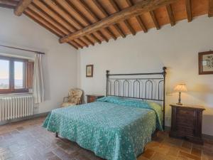 A bed or beds in a room at Holiday Home Cellole - Valluccia by Interhome
