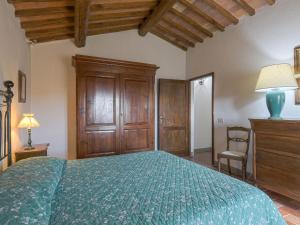 A bed or beds in a room at Holiday Home Cellole - Valluccia by Interhome