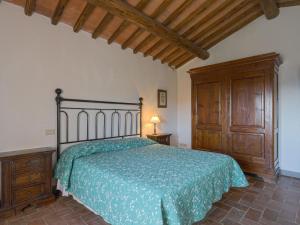 A bed or beds in a room at Holiday Home Cellole - Valluccia by Interhome
