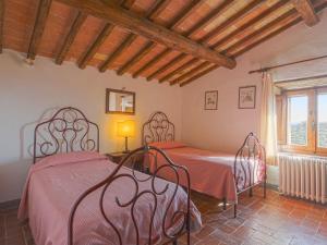 A bed or beds in a room at Holiday Home Cellole - Valluccia by Interhome