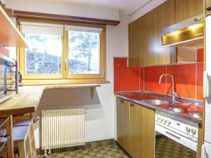 Kuchyň nebo kuchyňský kout v ubytování Apartment Entremont 60 by Interhome