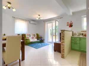 Kuchyň nebo kuchyňský kout v ubytování Holiday Home Carla by Interhome