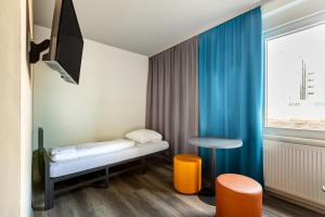 Cama o camas de una habitación en a&o Frankfurt Ostend