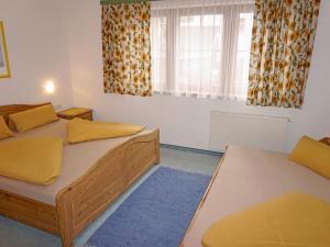 Ένα ή περισσότερα κρεβάτια σε δωμάτιο στο Apartment Christina by Interhome