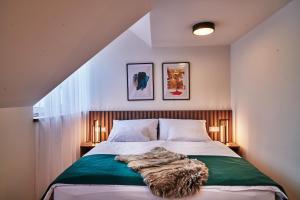 Posteľ alebo postele v izbe v ubytovaní Urpí­n City Residence + 37 fotografií