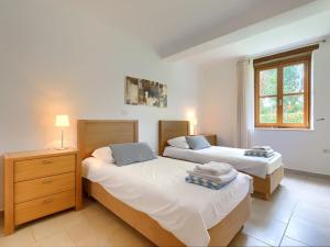 Posteľ alebo postele v izbe v ubytovaní Villa Remington by Interhome