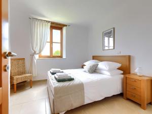 Posteľ alebo postele v izbe v ubytovaní Villa Stuartma by Interhome