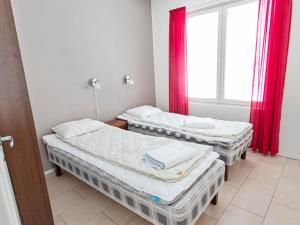 En eller flere senge i et værelse på Holiday Home Yllästar 3 as 506 by Interhome