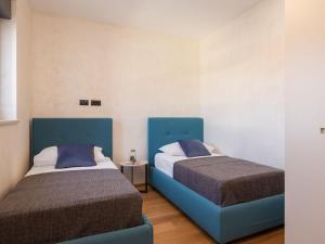 Posteľ alebo postele v izbe v ubytovaní Villa Old Olive VIII by Interhome