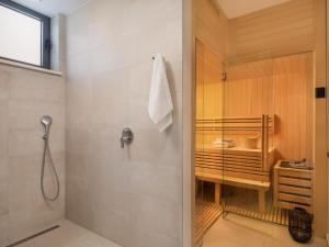 a bathroom with a shower and a sink at Villa Old Olive I by Interhome in Vodnjan
