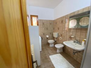 Kúpeľňa v ubytovaní Appartamento - Casa “Pepi” + 10 fotografií