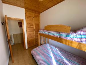 Двуетажно легло или двуетажни легла в стая в Appartamento - Casa “Pepi”
