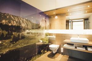 Koupelna v ubytování Hotel Hubertus - Au Bregenzerwald + 22 fotografií