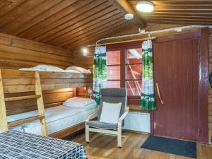 Postel nebo postele na pokoji v ubytování Holiday Home Livon pirtti 2 by Interhome