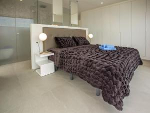 Postel nebo postele na pokoji v ubytování Villa Villa Atina by Interhome